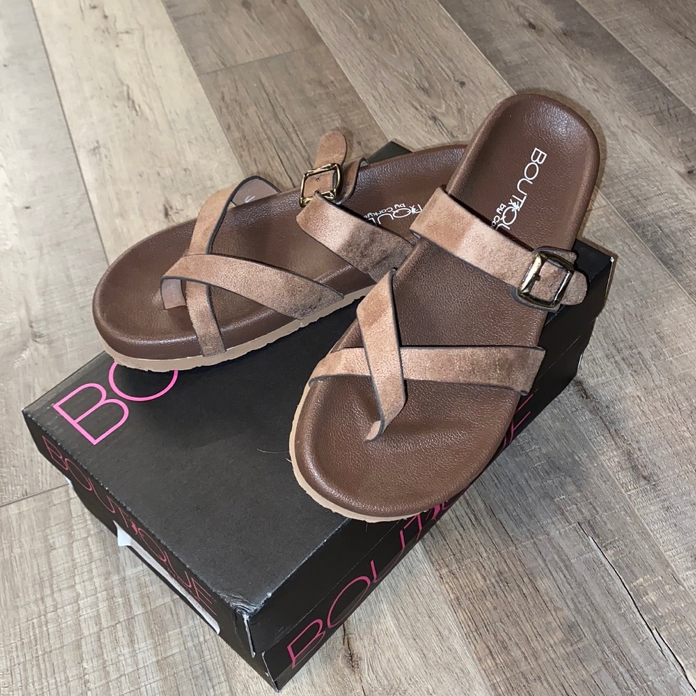 Tan Corkys sandals.